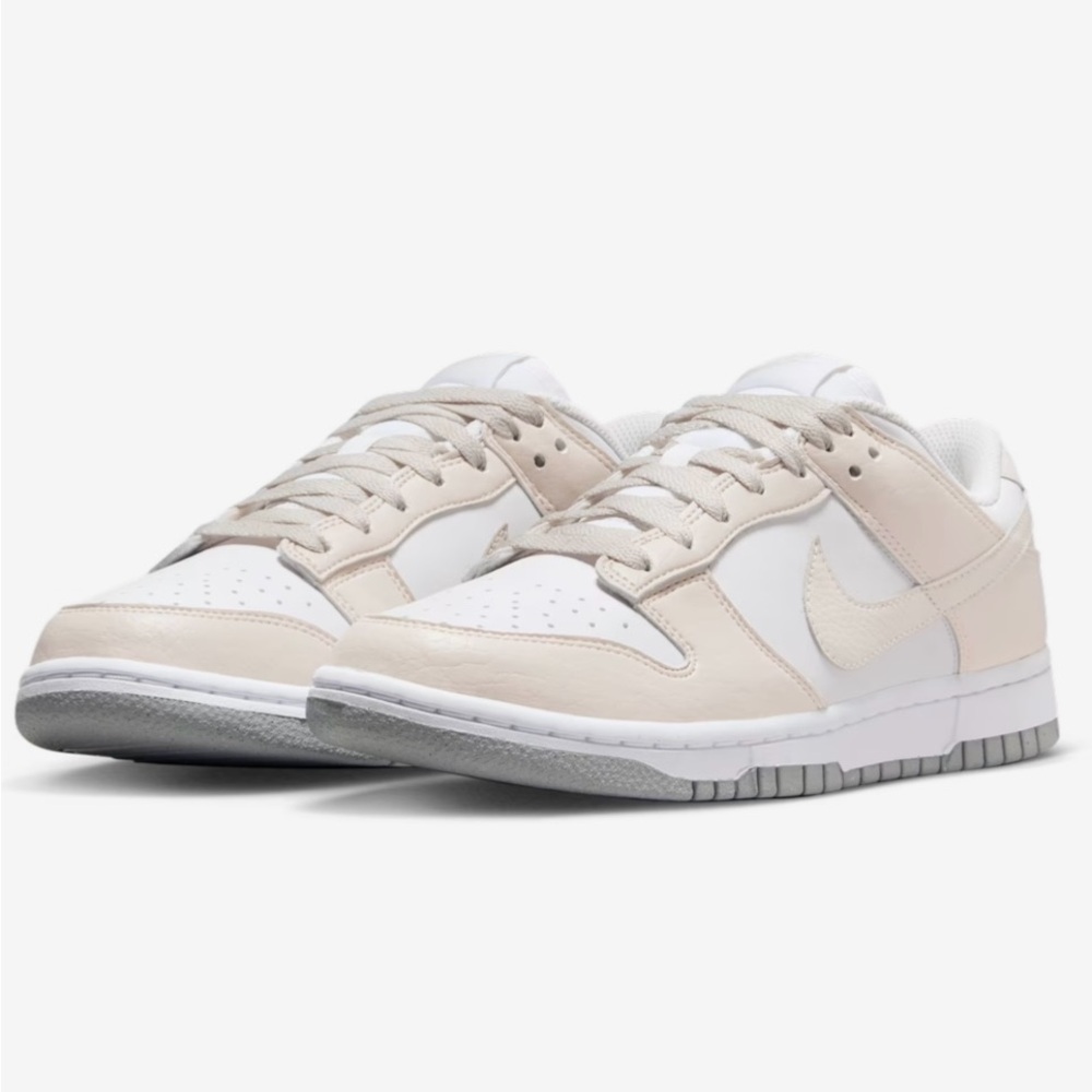 Nike Women's Dunk Low Next Nature
White and Light Orewood Brown